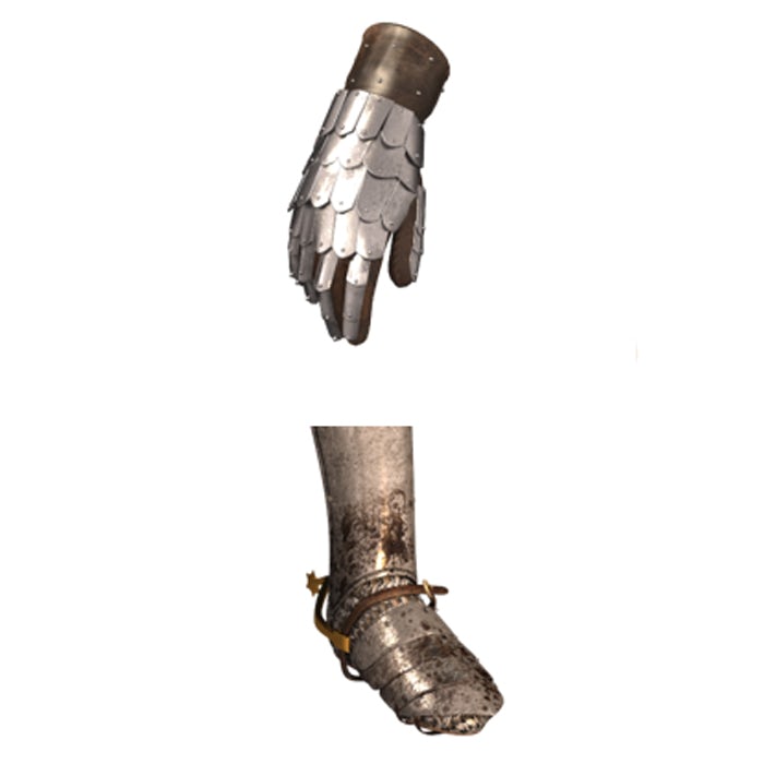 A medieval armour glove and shoe are displayed. The glove is at the top and is made up of metal scales, a bit like an armadillo. The shoe has lots of overlapping metal plates.